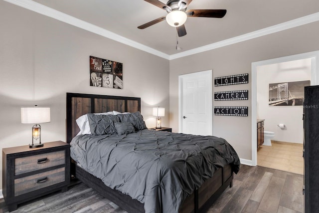 bedroom with ceiling fan, dark hardwood / wood-style floors, ensuite bath, and crown molding