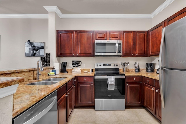 kitchen featuring appliances with stainless steel finishes, ornamental molding, light stone counters, and sink