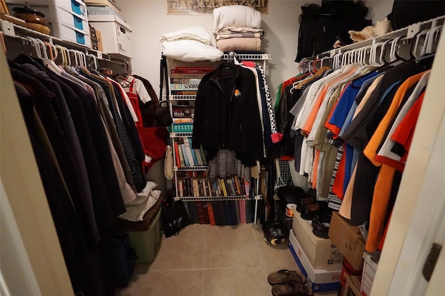 spacious closet featuring tile patterned floors