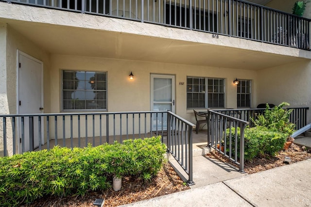 doorway to property with a balcony