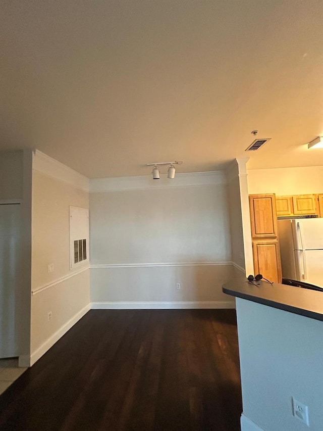 interior space with dark hardwood / wood-style flooring