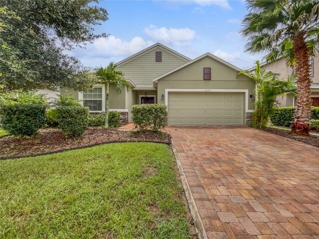 view of front of property with a garage