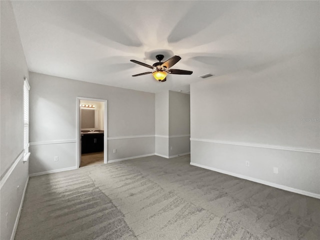 interior space featuring ceiling fan