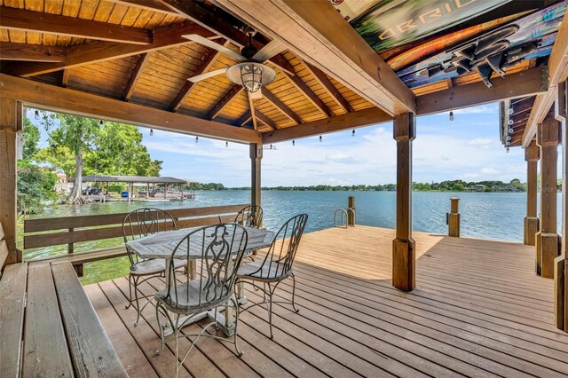 view of dock featuring a gazebo and a water view