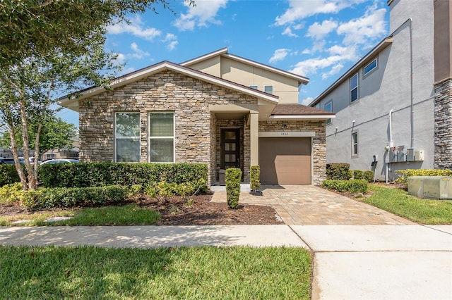 view of front of property featuring a garage