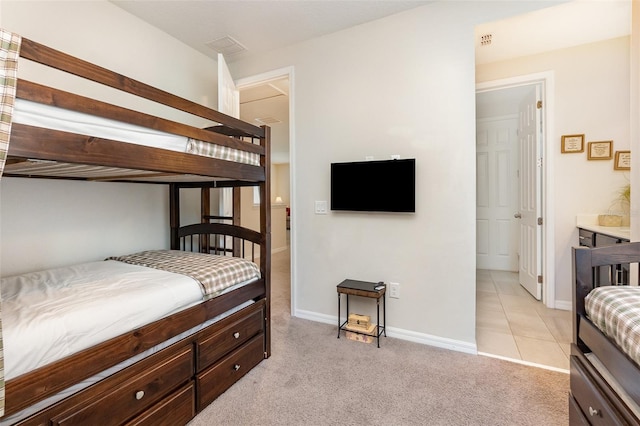 bedroom with light carpet