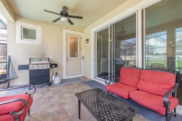 view of patio / terrace with a grill and ceiling fan