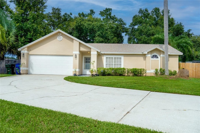 ranch-style home featuring a garage and a front yard