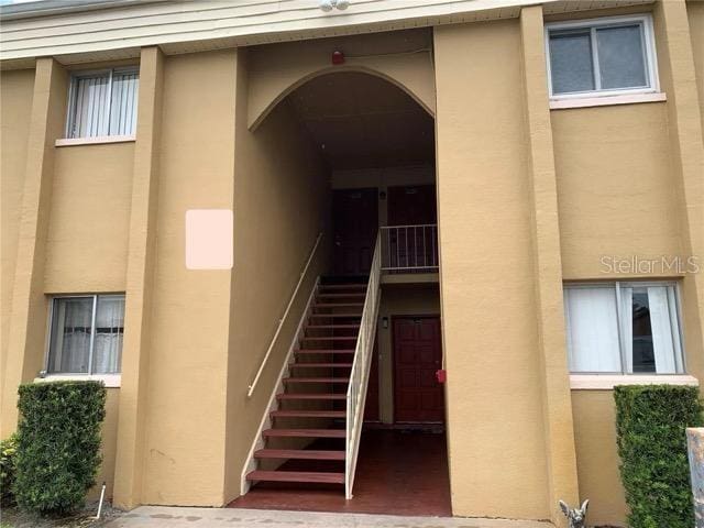 exterior space with stucco siding