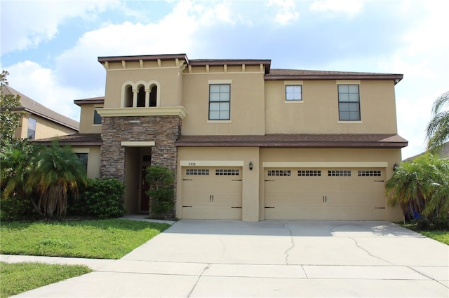 view of front of property with a garage