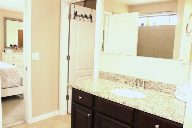 bathroom with vanity and tile patterned flooring