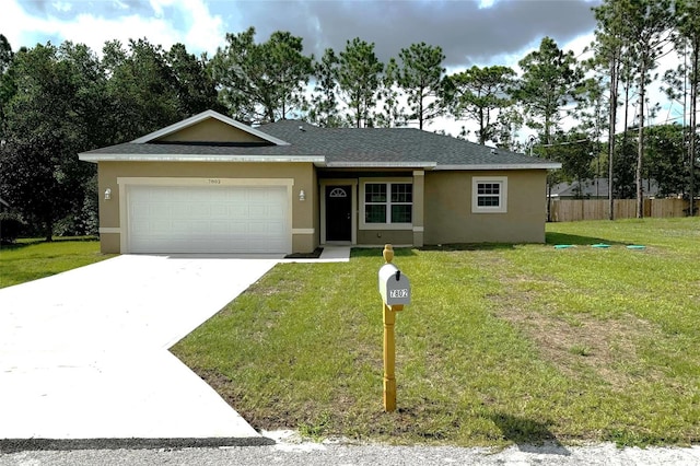 ranch-style home featuring a front lawn and a garage