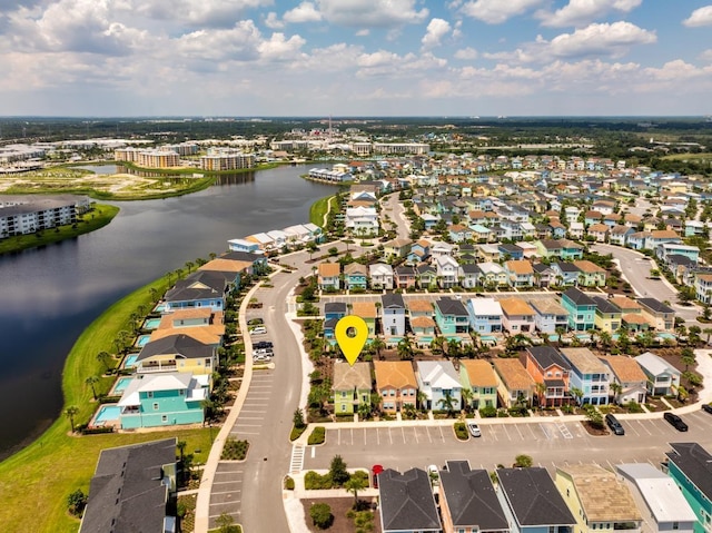 drone / aerial view featuring a water view