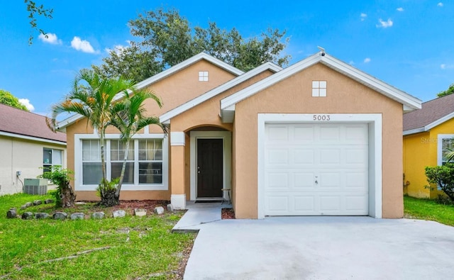 ranch-style house with cooling unit, driveway, an attached garage, and stucco siding