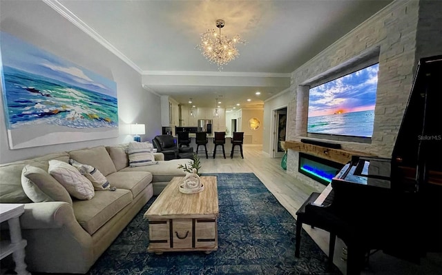 living room with crown molding, an inviting chandelier, and wood finished floors