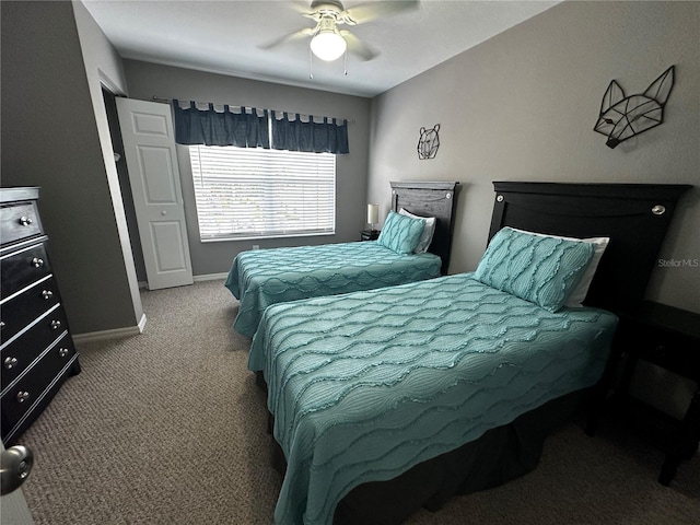 carpeted bedroom with baseboards and a ceiling fan