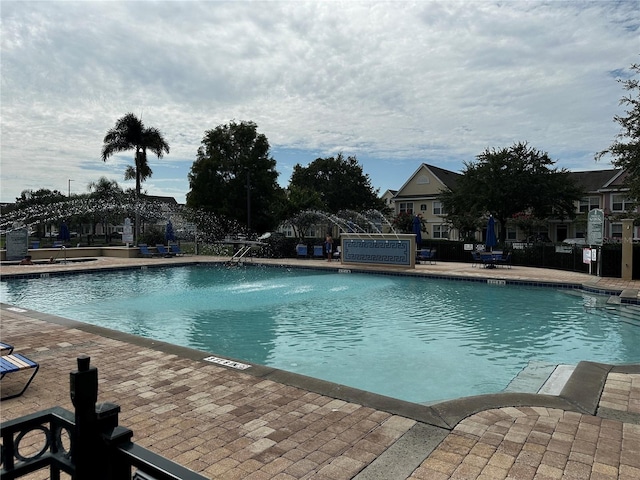 pool featuring a patio area