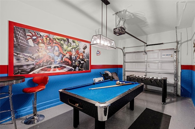 recreation room with a garage, pool table, and speckled floor