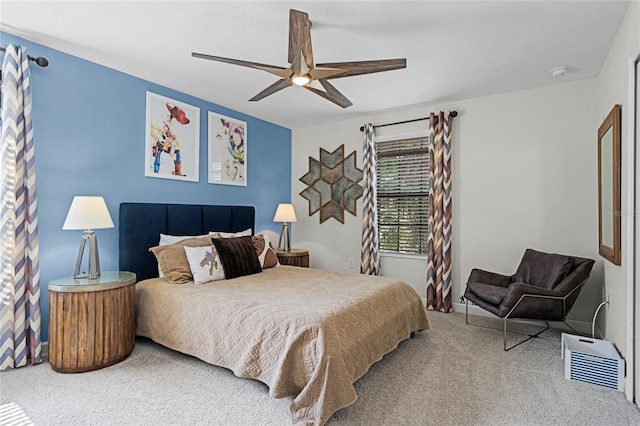 carpeted bedroom featuring a ceiling fan