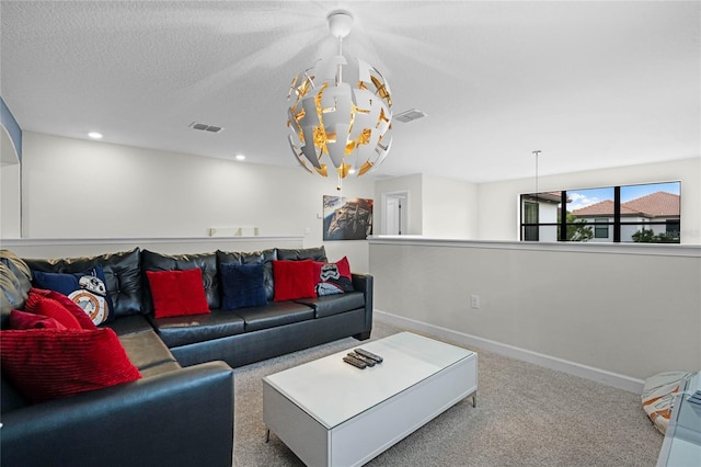 carpeted living room with recessed lighting, visible vents, a textured ceiling, and baseboards