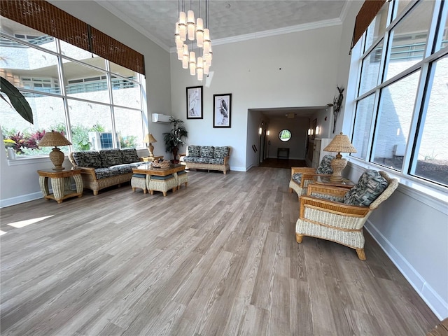 4631 S Atlantic Ave Unit 8301, Ponce Inlet, FL 32127 - living area featuring wood finished floors and crown molding