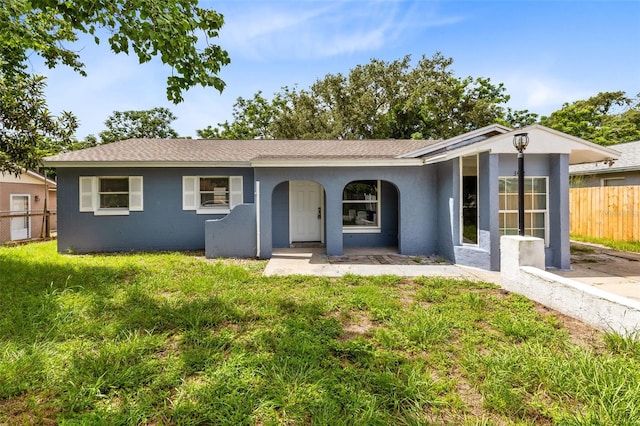 view of front of home with a front yard