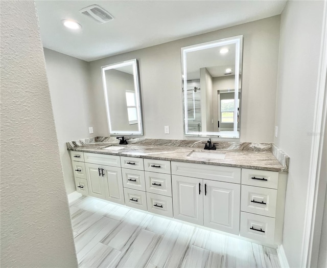 bathroom with double sink vanity