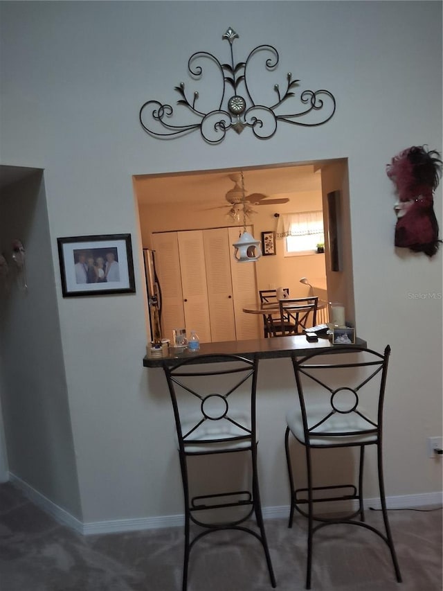 2909 Clubview Unit 2909, Orlando, FL 32822 - dining area featuring baseboards