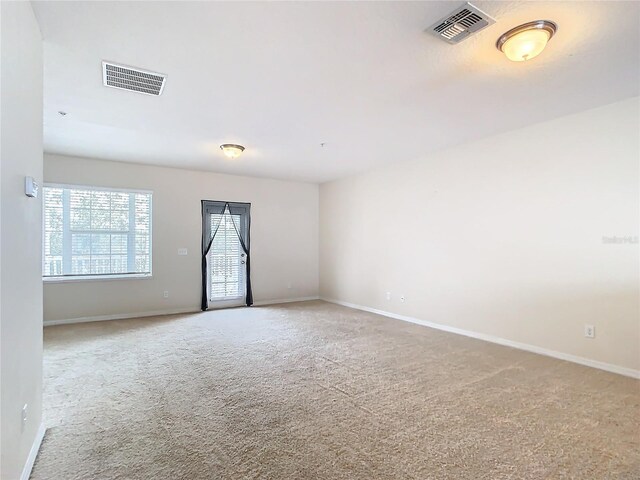 spare room with carpet flooring