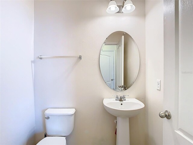 bathroom featuring toilet