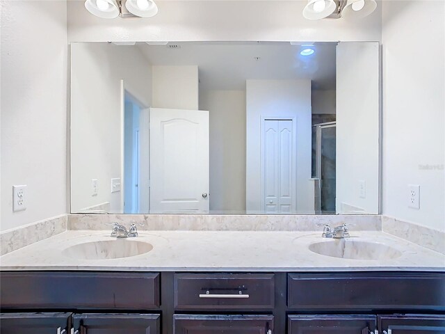 bathroom with double vanity