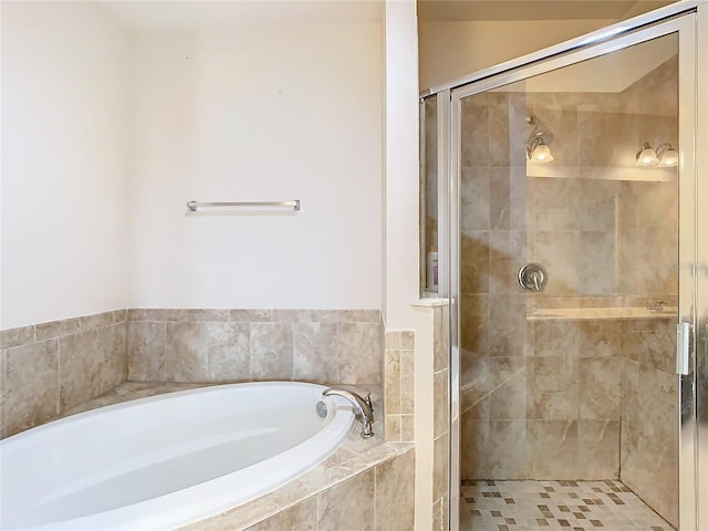 bathroom with shower with separate bathtub