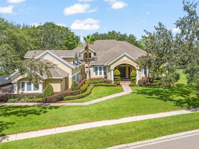 view of front facade with a front lawn