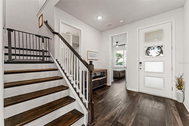 entryway featuring ceiling fan and dark hardwood / wood-style floors