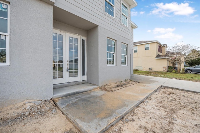 doorway to property featuring french doors