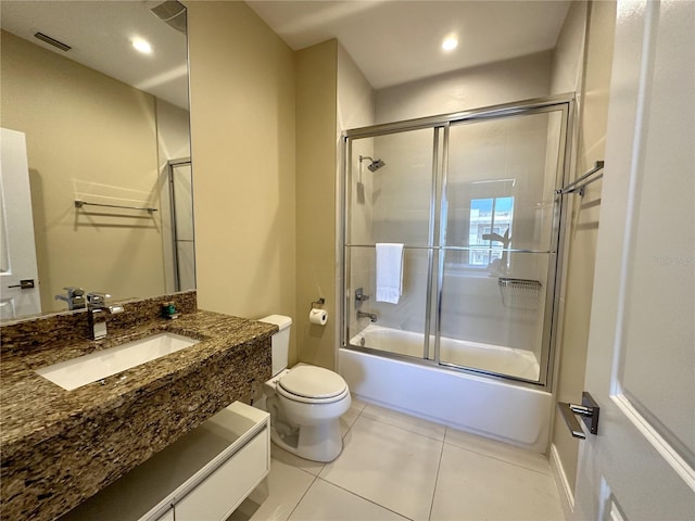 full bath with vanity, recessed lighting, tile patterned flooring, toilet, and combined bath / shower with glass door