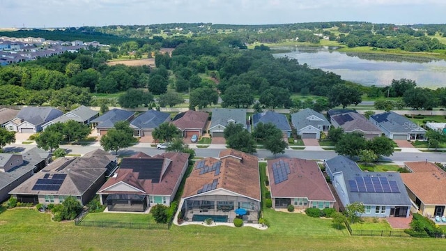 bird's eye view featuring a residential view and a water view