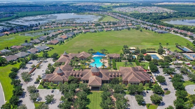 bird's eye view with a water view and a residential view