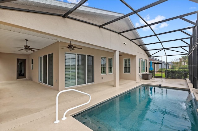 pool with a lanai and a patio