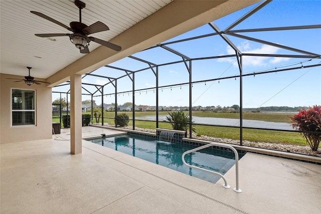 pool featuring a patio, a lanai, and a water view