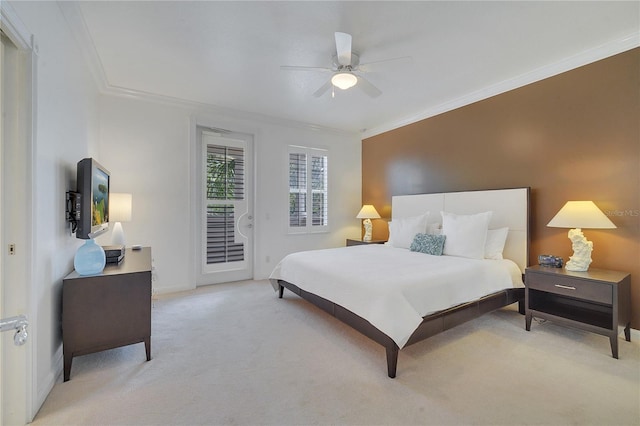 carpeted bedroom with crown molding, access to outside, and ceiling fan