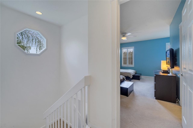 hallway with carpet flooring