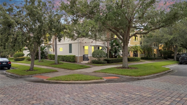 view of front of home with a front yard