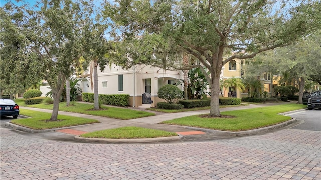 view of front of house with a front lawn