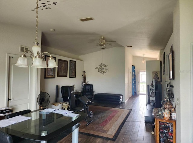 living room featuring vaulted ceiling, ceiling fan, and dark wood-type flooring