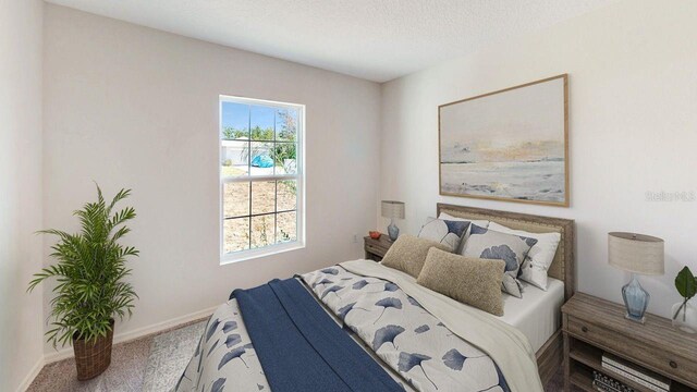 carpeted bedroom with a textured ceiling