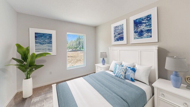 bedroom featuring light colored carpet