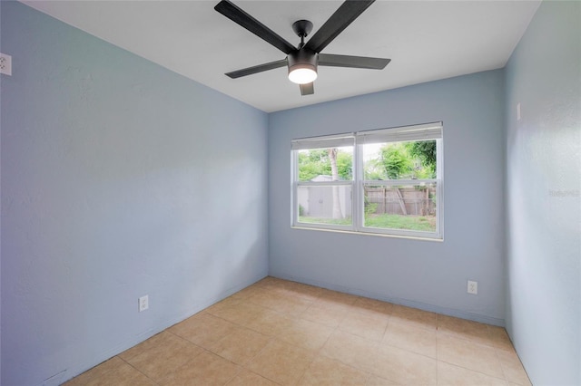 spare room featuring ceiling fan