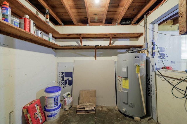 utility room featuring water heater