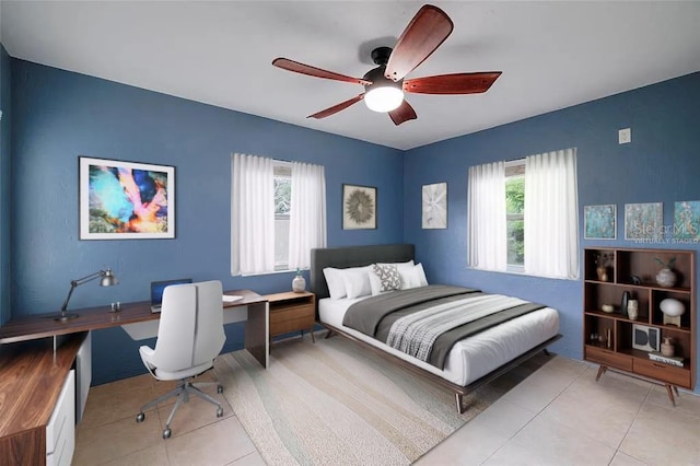 bedroom with light tile patterned flooring, ceiling fan, and multiple windows